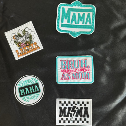 Five patches with text and graphics "Mama" or "Mom" on a black satin background